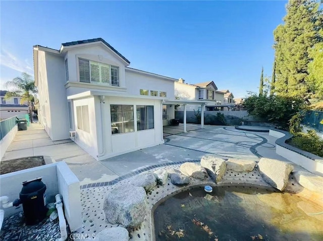 2768 Somerset Pl, Rowland Heights, CA 91748 - rear view of house featuring a fenced backyard, a patio area, and stucco siding