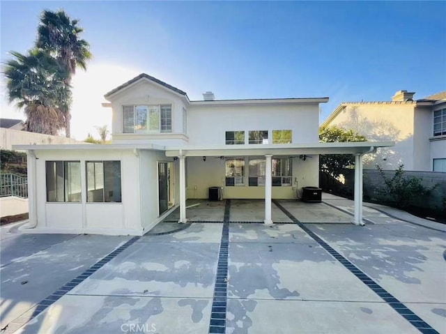2768 Somerset Pl, Rowland Heights, CA 91748 - rear view of house featuring fence, a patio, stucco siding, and central AC