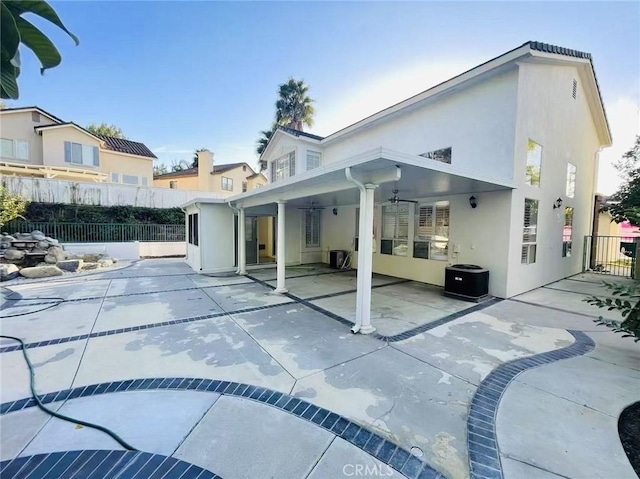 2768 Somerset Pl, Rowland Heights, CA 91748 - rear view of property featuring central air condition unit, a patio, fence, and stucco siding