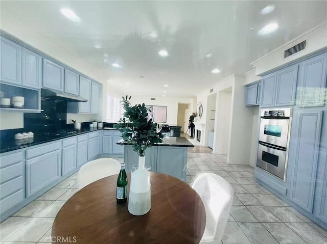 2768 Somerset Pl, Rowland Heights, CA 91748 - kitchen featuring dark countertops, double oven, recessed lighting, under cabinet range hood, and visible vents