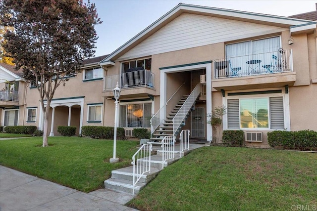 view of property featuring stairs