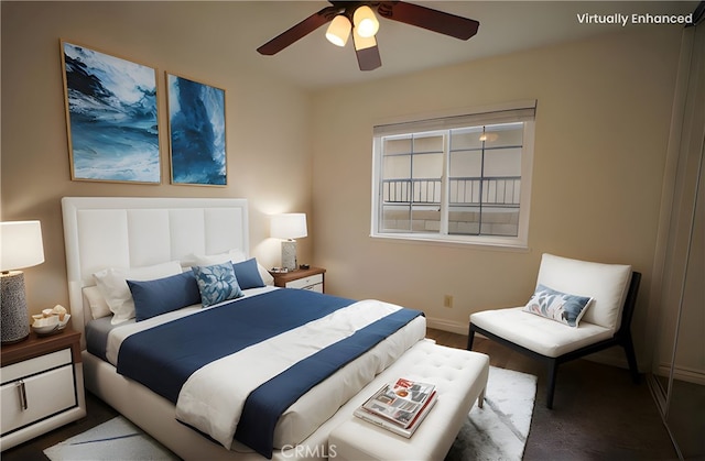 bedroom featuring a ceiling fan and baseboards