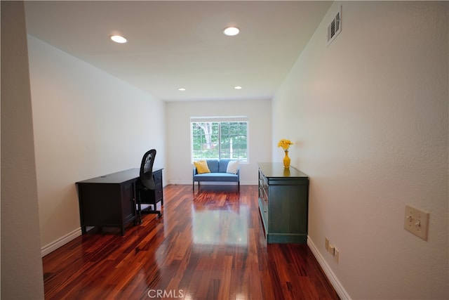 office featuring dark wood-style floors, visible vents, baseboards, and recessed lighting