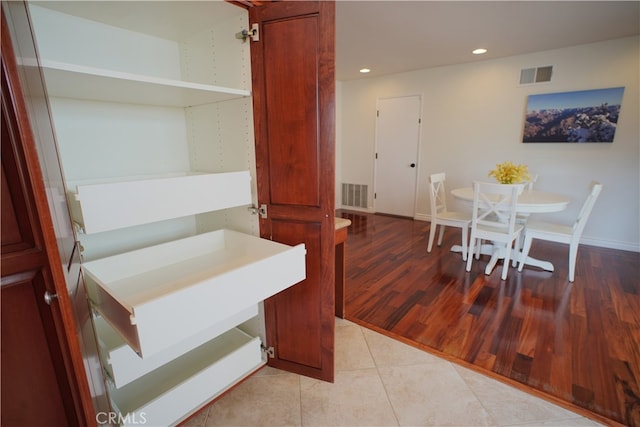 dining space with recessed lighting, light tile patterned flooring, visible vents, and baseboards