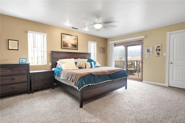 bedroom featuring visible vents, a ceiling fan, access to outside, baseboards, and light colored carpet