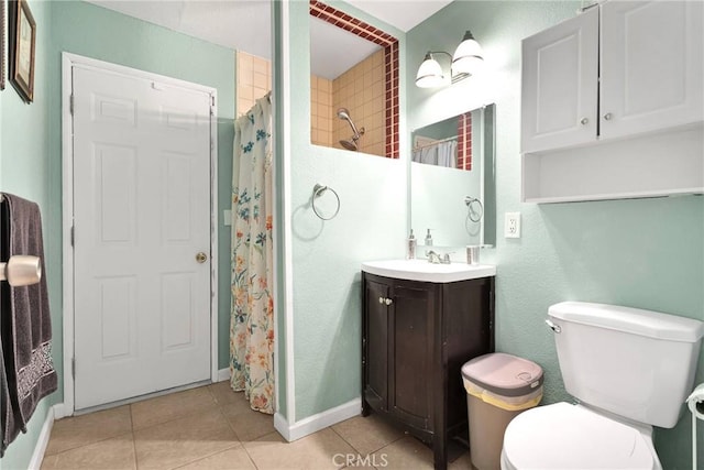 full bath featuring vanity, a shower with curtain, baseboards, tile patterned flooring, and toilet