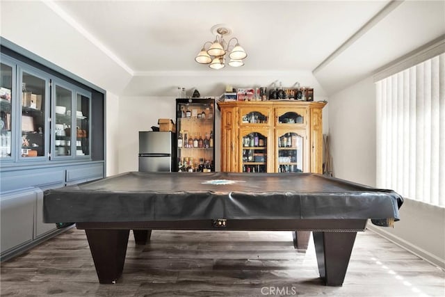 rec room featuring vaulted ceiling, plenty of natural light, billiards, and wood finished floors