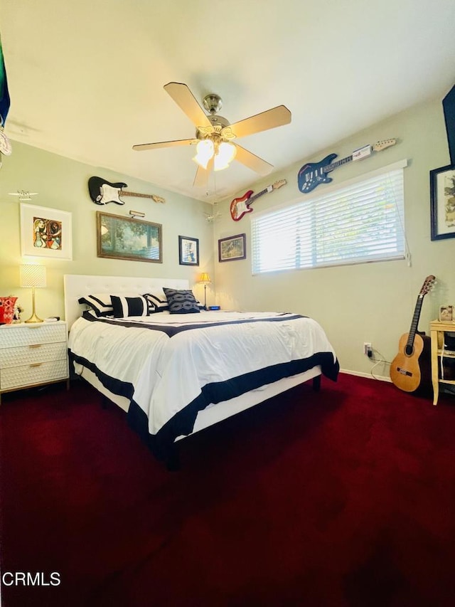 bedroom with carpet floors and a ceiling fan