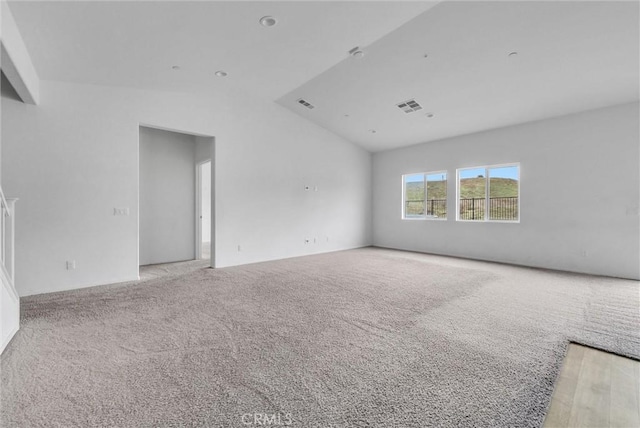 222 Garden Air Ct, Calimesa, CA 92320 - spare room with lofted ceiling, carpet, and visible vents
