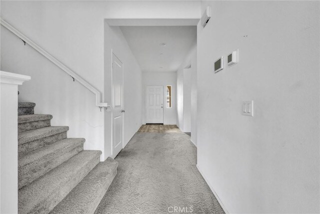 222 Garden Air Ct, Calimesa, CA 92320 - hallway with stairs and carpet