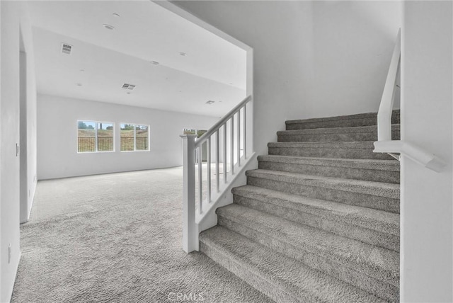 222 Garden Air Ct, Calimesa, CA 92320 - stairs featuring visible vents and carpet