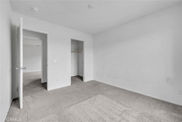 222 Garden Air Ct, Calimesa, CA 92320 - unfurnished bedroom featuring a closet and carpet floors