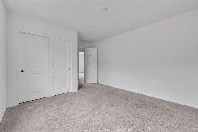 222 Garden Air Ct, Calimesa, CA 92320 - unfurnished bedroom with a closet and carpet floors