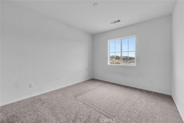 222 Garden Air Ct, Calimesa, CA 92320 - empty room with carpet, visible vents, and baseboards