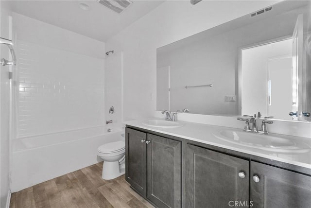 222 Garden Air Ct, Calimesa, CA 92320 - full bathroom featuring a sink, visible vents, toilet, and wood finished floors