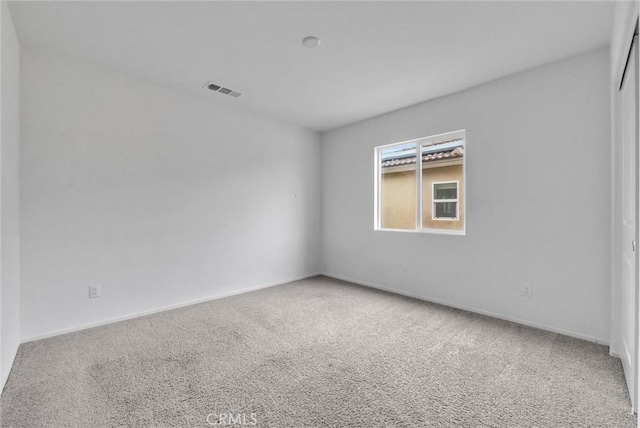 222 Garden Air Ct, Calimesa, CA 92320 - empty room featuring visible vents, carpet floors, and baseboards