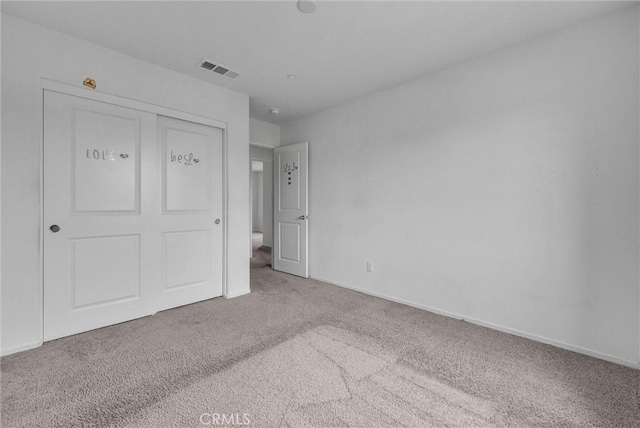 222 Garden Air Ct, Calimesa, CA 92320 - unfurnished bedroom with visible vents, carpet, a closet, and baseboards