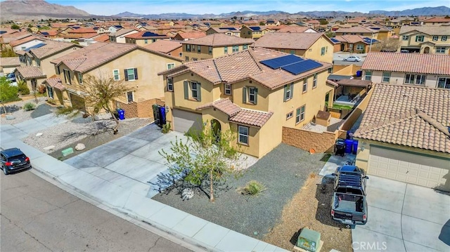 bird's eye view with a mountain view and a residential view
