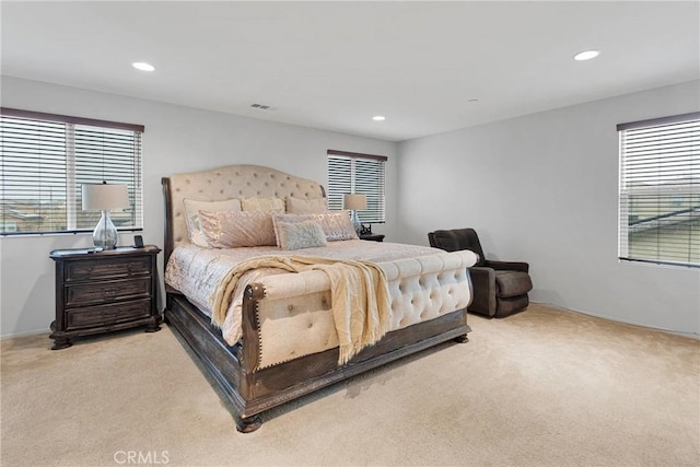 bedroom featuring recessed lighting, visible vents, and carpet floors