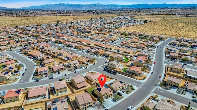 drone / aerial view with a mountain view and a residential view
