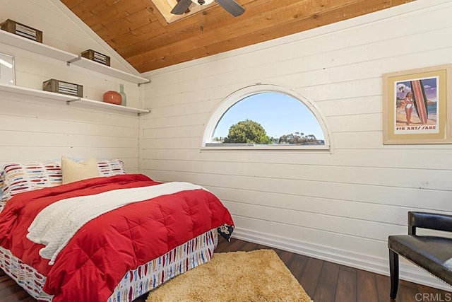 bedroom with a ceiling fan, dark wood finished floors, wooden ceiling, and vaulted ceiling