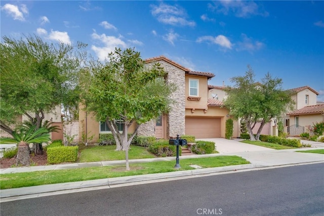 113 Tearose, Irvine, CA 92603 - mediterranean / spanish home featuring stucco siding, a tiled roof, driveway, and a garage