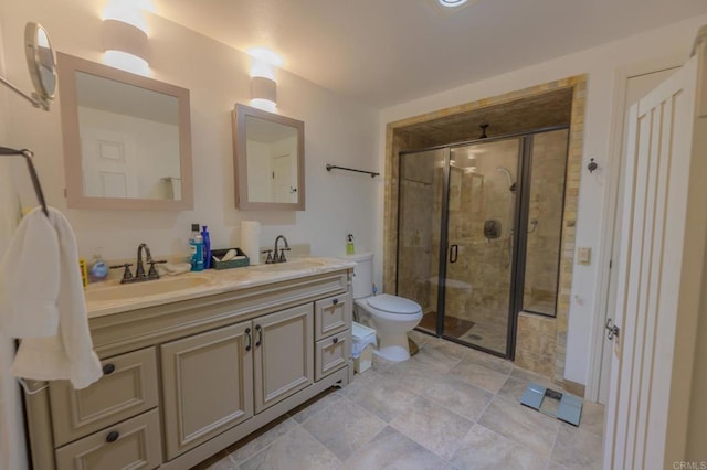 full bath with double vanity, a stall shower, toilet, and a sink