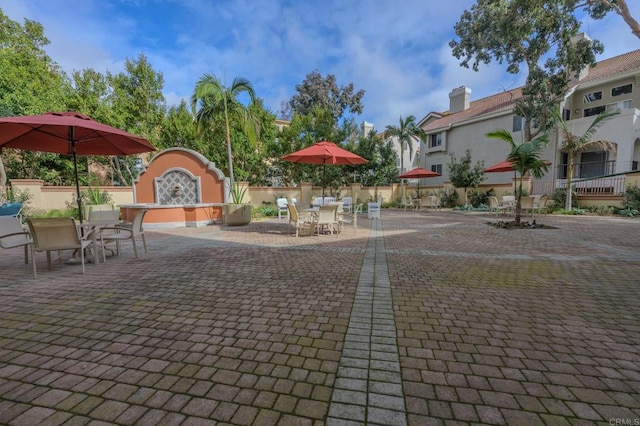 view of home's community featuring a patio