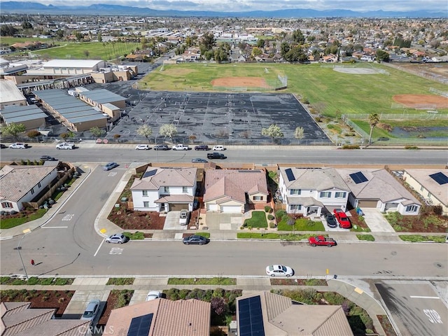 aerial view featuring a mountain view and a residential view