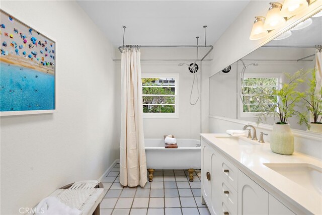 2120 Ocean Way, Laguna Beach, CA 92651 - full bath featuring a sink, shower / bathtub combination with curtain, double vanity, and tile patterned floors
