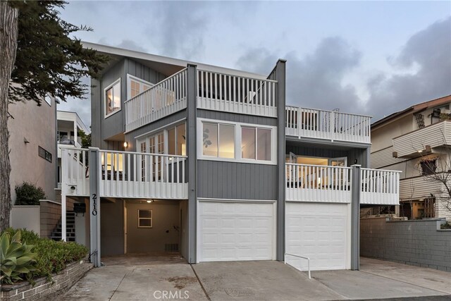 2120 Ocean Way, Laguna Beach, CA 92651 - view of front of home featuring concrete driveway, stairs, and a garage