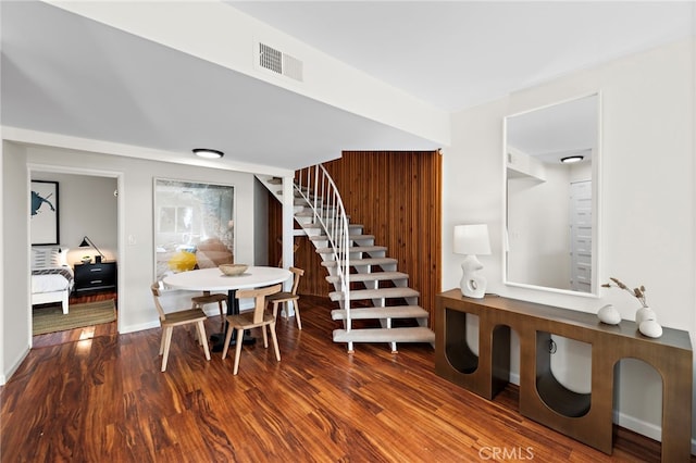 2120 Ocean Way, Laguna Beach, CA 92651 - dining space featuring visible vents, stairs, and wood finished floors