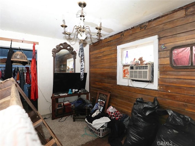 3586 Halika St, Clearlake, CA 95422 - interior space with carpet flooring, an inviting chandelier, cooling unit, and wood walls