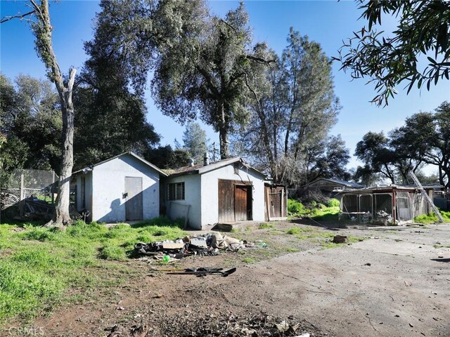 3586 Halika St, Clearlake, CA 95422 - exterior space featuring stucco siding and an outbuilding