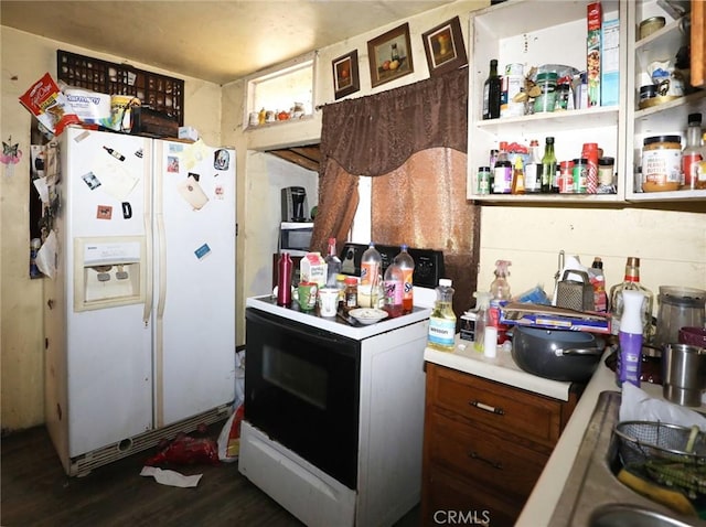 3586 Halika St, Clearlake, CA 95422 - kitchen with electric stove, white fridge with ice dispenser, brown cabinetry, light countertops, and dark wood-style flooring