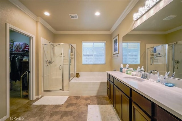 bathroom featuring a walk in closet, a bath, visible vents, a shower stall, and vanity