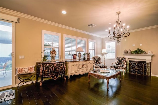30459 Cowboy Ln, Menifee, CA 92584 - living area with a chandelier, wood finished floors, ornamental molding, a fireplace, and recessed lighting