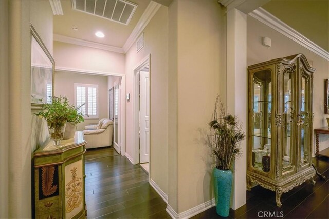 30459 Cowboy Ln, Menifee, CA 92584 - corridor with dark wood-style floors, ornamental molding, and baseboards