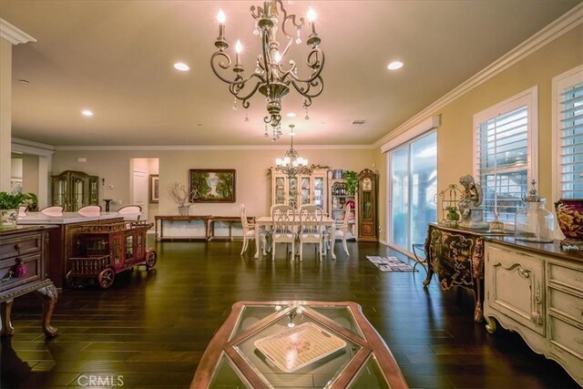 30459 Cowboy Ln, Menifee, CA 92584 - dining area with a chandelier, hardwood / wood-style flooring, recessed lighting, and crown molding