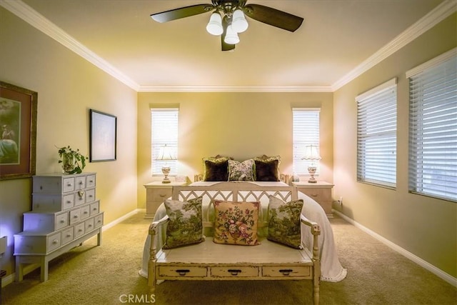 bedroom featuring crown molding, baseboards, multiple windows, and carpet