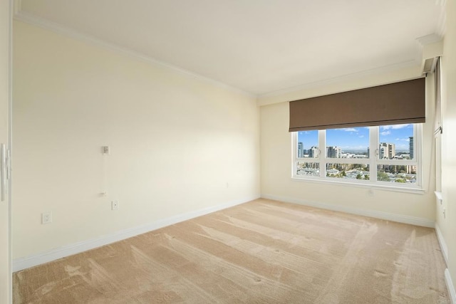 3890 Nobel Dr Unit 1307, San Diego, CA 92122 - spare room featuring crown molding, baseboards, light carpet, and a view of city