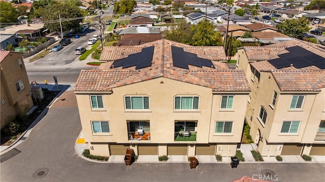 drone / aerial view with a residential view