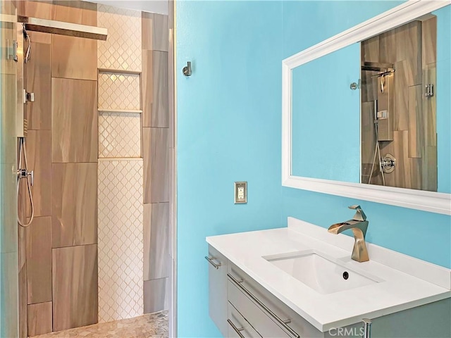 full bathroom with a shower and vanity