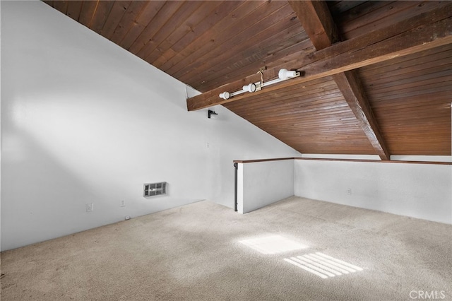 bonus room featuring carpet, lofted ceiling with beams, and wood ceiling