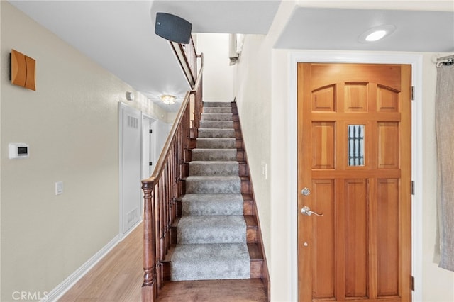 1330 Vista Grande Unit 27, Fullerton, CA 92835 - stairway with wood finished floors and baseboards