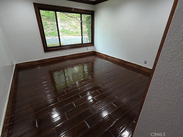 28132 Via Congora, Mission Viejo, CA 92692 - spare room with dark wood-type flooring and baseboards