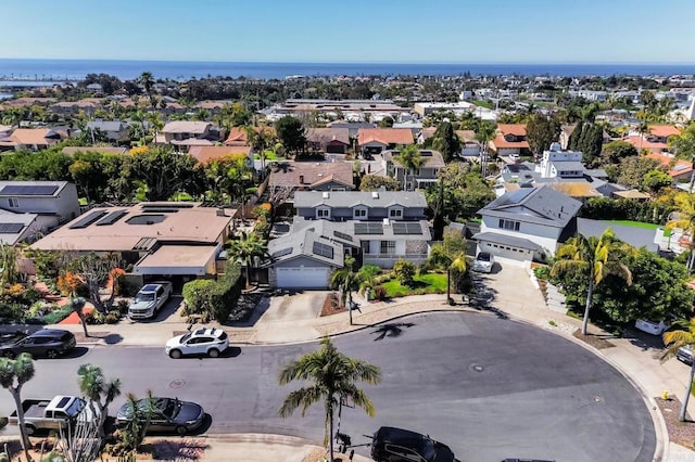 aerial view with a water view and a residential view