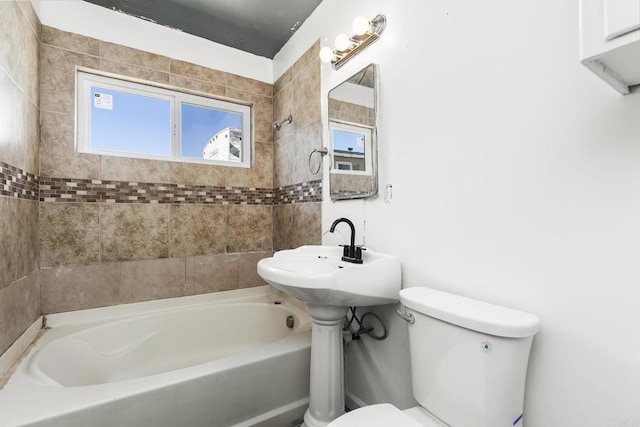 full bath with toilet and shower / washtub combination