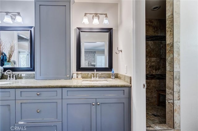 27485 Pachea Trl, Hemet, CA 92544 - full bath with a sink, double vanity, and a tile shower