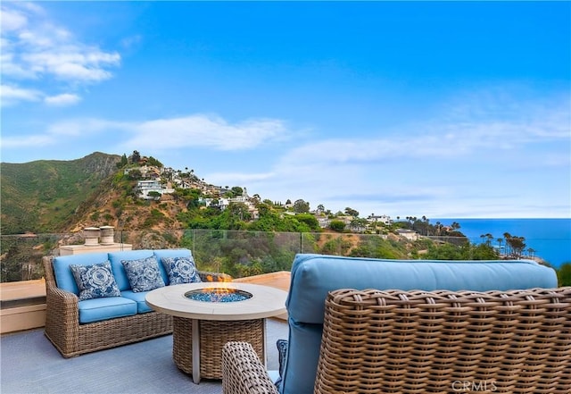 21732 Wesley Dr Unit 6, Laguna Beach, CA 92651 - view of patio / terrace with an outdoor fire pit